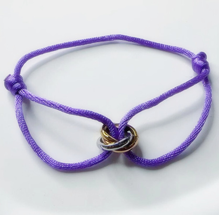 Határokon átnyúló legkelendőbb háromgyűrűs piros kötél karkötő pároknak, könnyű luxus résbe fonott karkötő, egyszerű férfi ékszerek