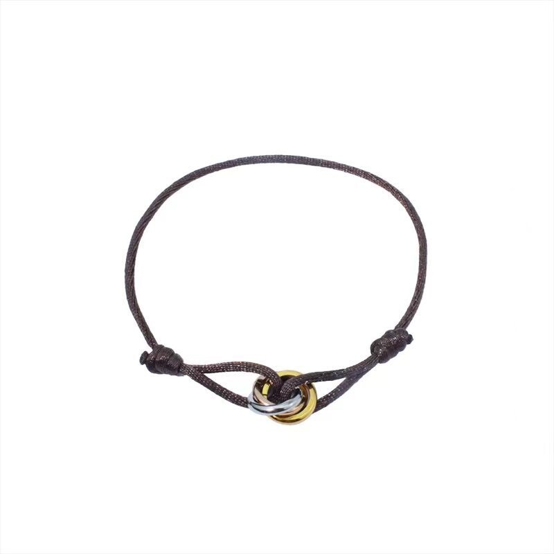 Határokon átnyúló legkelendőbb háromgyűrűs piros kötél karkötő pároknak, könnyű luxus résbe fonott karkötő, egyszerű férfi ékszerek