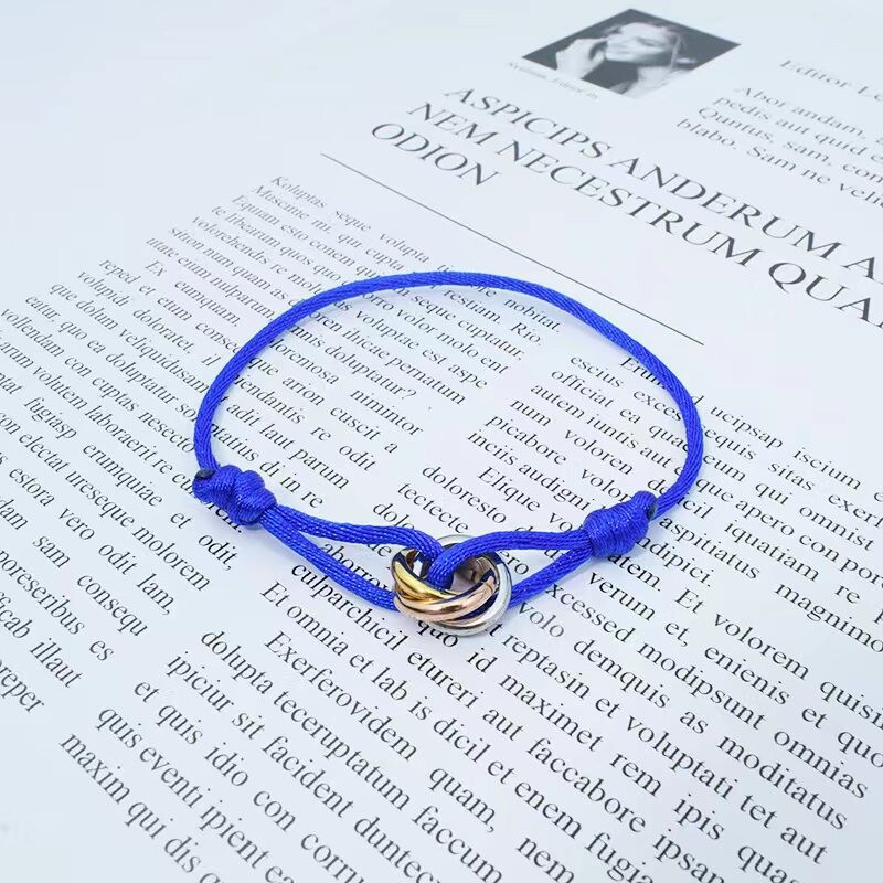 Határokon átnyúló legkelendőbb háromgyűrűs piros kötél karkötő pároknak, könnyű luxus résbe fonott karkötő, egyszerű férfi ékszerek