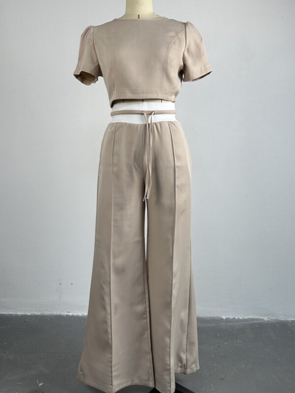 Elegantni ženski jednobojni dvodijelni kompleti 2024. proljeće ljeto novi top s puf rukavima s okruglim izrezom i ležerno odijelo širokih nogavica na vezanje