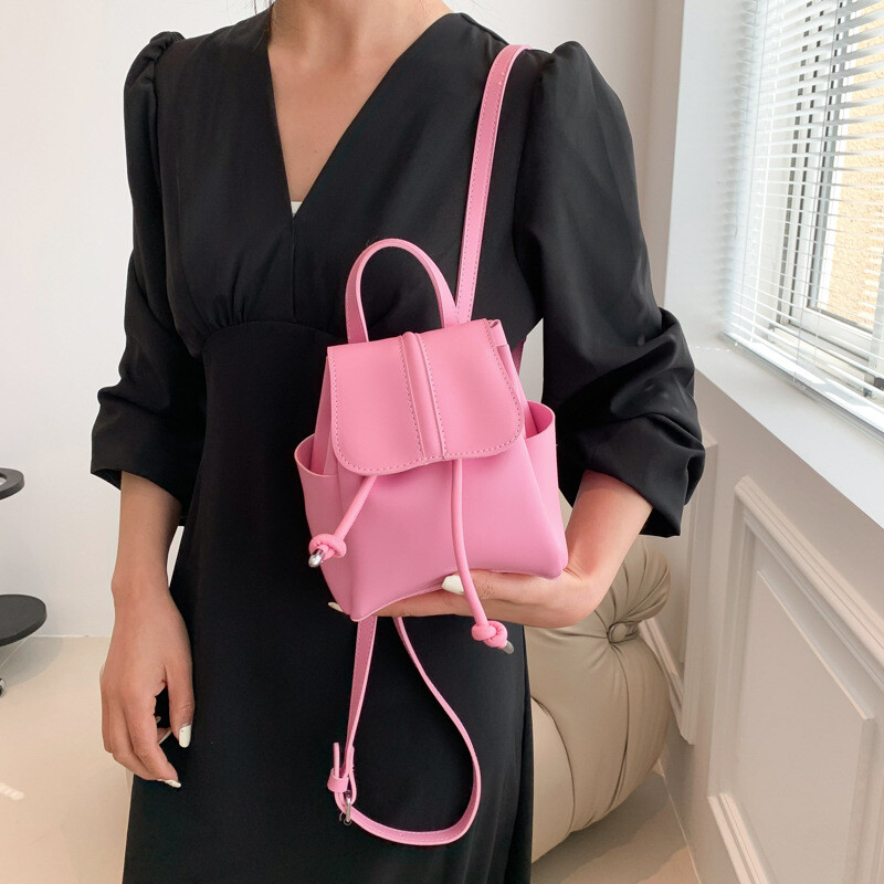 Mekani PU ruksak na dva ramena, ženski korejski modni, ležerni jednobojni, jednostavni mini ruksak, kopča s uzicom, slatki ruksak