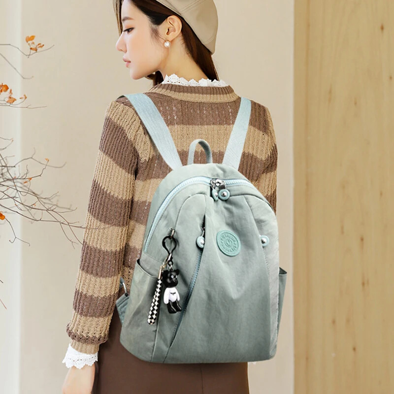 Novi vodootporni ženski ruksak od najlonske tkanine iz 2024., modne školske torbe za tinejdžerice, visokokvalitetna torba za rame, putni ruksak