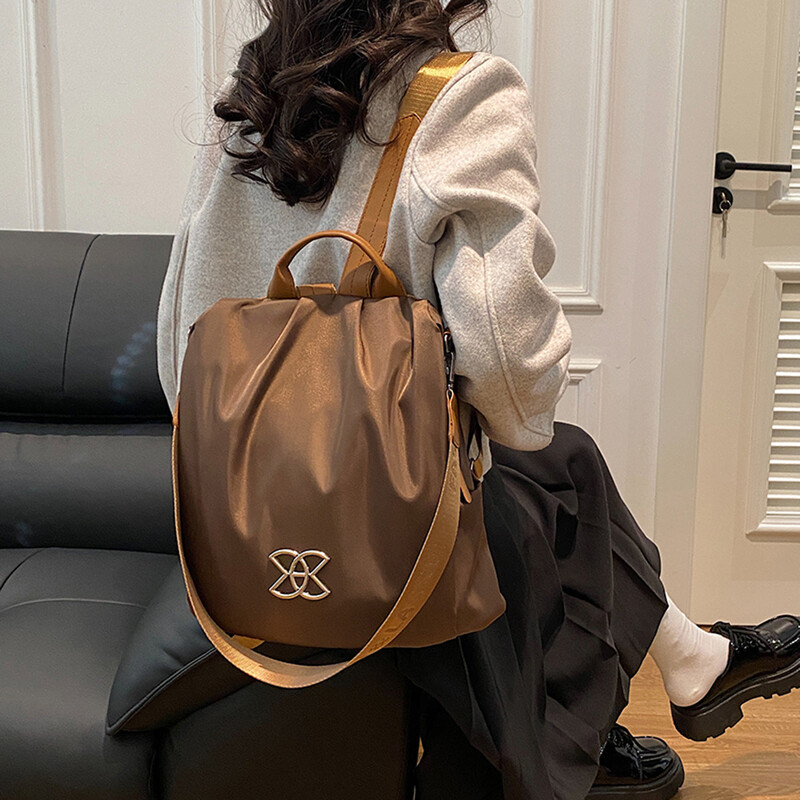 Luksusa vienkrāsu dizaina mugursoma ūdensizturīga biznesa sieviešu mugursoma atpūtai sieviešu plecu soma liela ietilpības mugursoma