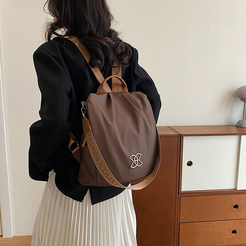 Luksusa vienkrāsu dizaina mugursoma ūdensizturīga biznesa sieviešu mugursoma atpūtai sieviešu plecu soma liela ietilpības mugursoma