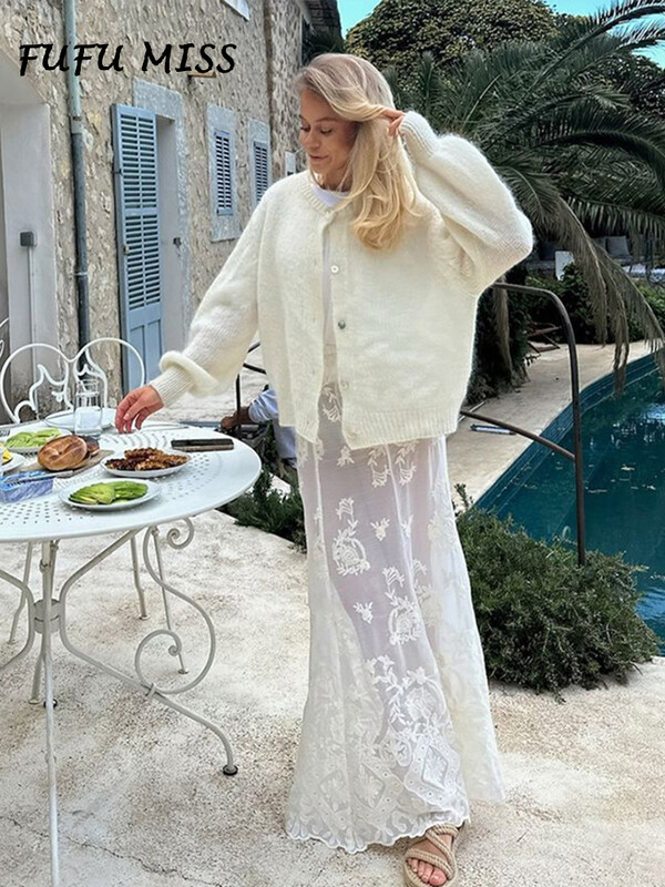 Ikdienas vienkrāsains trikotāžas jaciņš sievietēm ar O veida kakla izgriezumu garām piedurknēm, vienrindu, mājīgs džemperis 2024. gada rudenī, jaunā dāmu brīvs, slinks trikotāža