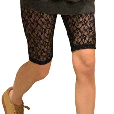 Sieviešu puķu mežģīnes ar dobām tīklveida šortiem, pamatīgi caurspīdīgas zeķbikses apakšā