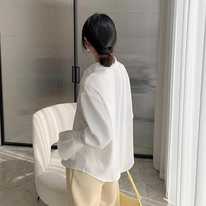Plisirana košulja s lepršavim rukavima Ženske bijele francuske vintage chic elegantne bluze dugih rukava Modne klasične uredske dame jednobojne majice