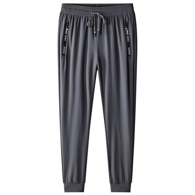 Liela izmēra 7XL 8XL vīriešu ledus zīda bikses mīksts elastīgs audums vasaras sporta zālei skriešanas bikses plānas elastīgas jostasvietas biznesa bikses