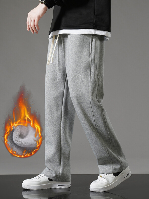 Nove zimske muške trenirke za 2023. Flis podstava Sportska odjeća Debele tople ravne ležerne sportske hlače Muške termo baršunaste hlače