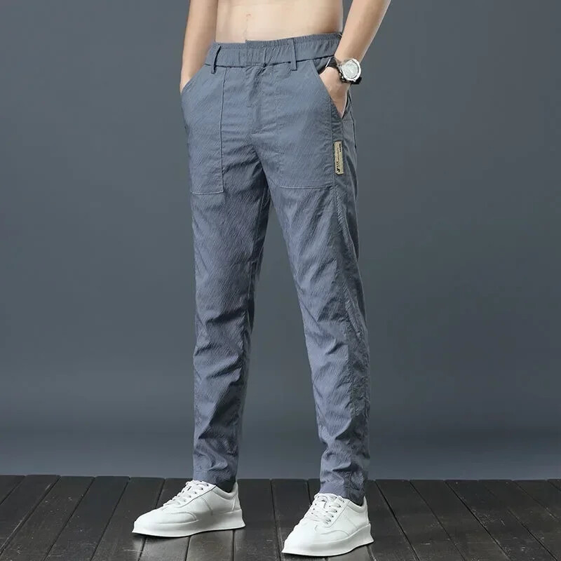 Vīriešu ledus zīda īpaši plānas ikdienas bikses korejiešu stilā, modernas, brīvas, taisnas, vieglas, ātri žūstošas garās bikses vasarai