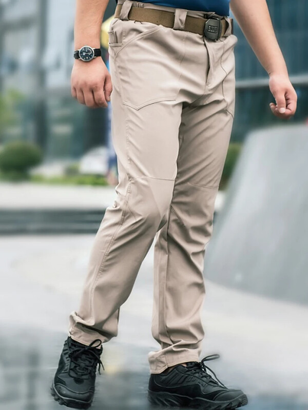 Āra plānās taktiskās bikses elastīgas ātri žūstošas treniņbikses brīvas alpīnisma bikses ar vairākām kabatām treniņa apģērbs