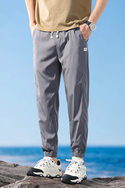 Ultravékony férfi nadrág, bokáig érő, alkalmi rugalmas deréknadrág Légáteresztő klasszikus kültéri, kötött lábú melegítőnadrág férfi