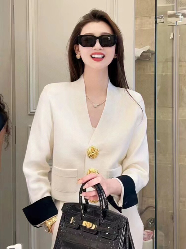 Ženski francuski stil Vintage luksuzni šik elegantni pleteni kardigan s gumbima proljeće jesen crno bijeli džemper dugih rukava s V izrezom
