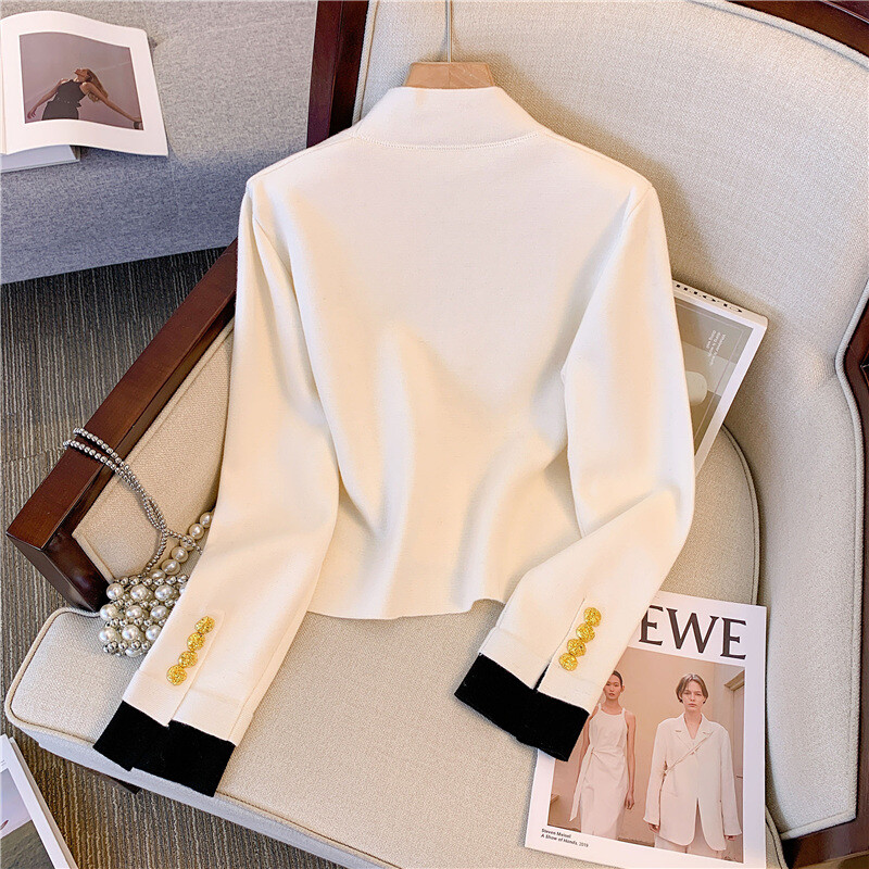 Ženski francuski stil Vintage luksuzni šik elegantni pleteni kardigan s gumbima proljeće jesen crno bijeli džemper dugih rukava s V izrezom