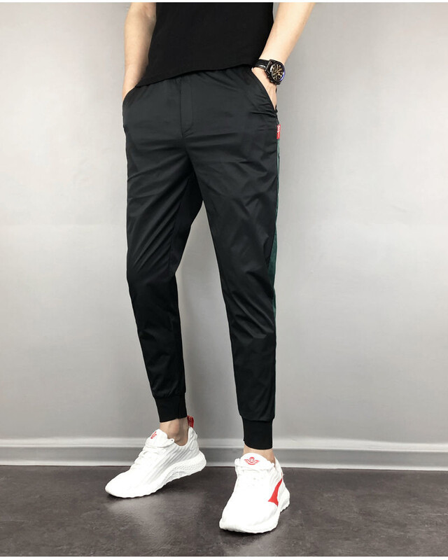 Vīriešu sporta bikses 2020. gads. Populāras ikdienas sporta bikses Vīriešu skriešanas bikses Modes ielas apģērbs Vīriešu formāls ikdienas apģērbs