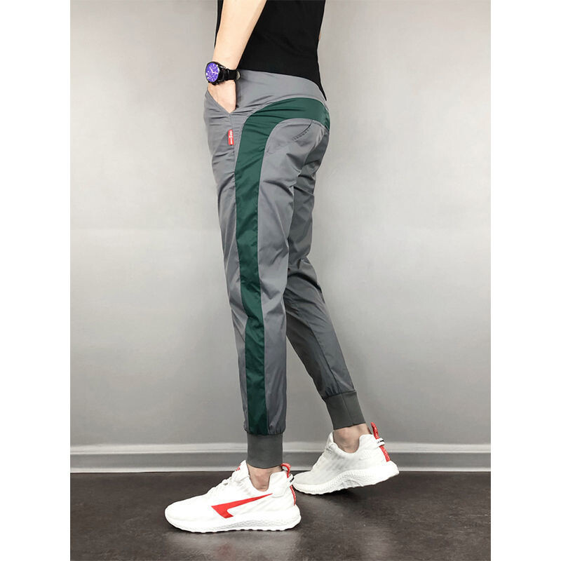 Vīriešu sporta bikses 2020. gads. Populāras ikdienas sporta bikses Vīriešu skriešanas bikses Modes ielas apģērbs Vīriešu formāls ikdienas apģērbs