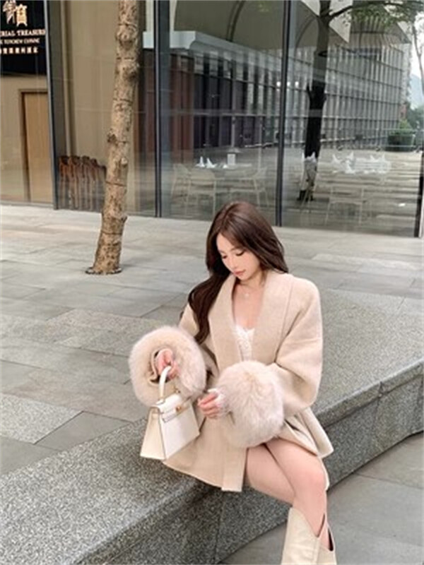 Pelēkas kaklasaites jostasvietas kolekcijas vilnas mētelis sievietēm rudens un ziemas 2024. gada jauns ar garām piedurknēm brīvs augstas klases apmetņa mētelis vidēja garuma augšpusē