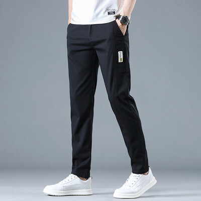 Ανοιξιάτικη καλοκαιρινή μόδα Ανδρικές απλικέ Casual Παντελόνι Καφέ ελαστικό λεπτό παντελόνι επώνυμα Νέο άνετο τέντωμα παντελόνι στη μέση