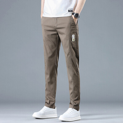 Ανοιξιάτικη καλοκαιρινή μόδα Ανδρικές απλικέ Casual Παντελόνι Καφέ ελαστικό λεπτό παντελόνι επώνυμα Νέο άνετο τέντωμα παντελόνι στη μέση