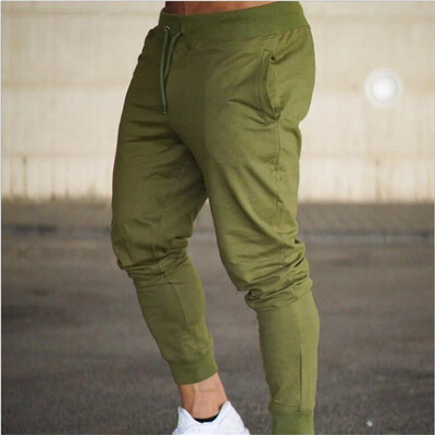 2024 Fashion Meeste Jõusaalid Puhtavärvilised püksid Joggers Fitness Vabaaja pikad püksid Meeste Treening Kitsad dressipüksid Jogger dressipüksid