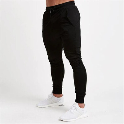 2024 Fashion Meeste Jõusaalid Puhtavärvilised püksid Joggers Fitness Vabaaja pikad püksid Meeste Treening Kitsad dressipüksid Jogger dressipüksid