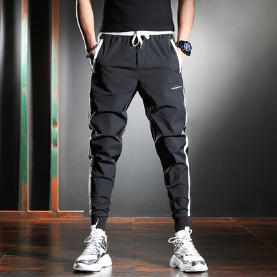 Ανδρικό λεπτό λευκό ριγέ παντελόνι Καλοκαιρινό καθημερινό λεπτό αθλητικό μολύβι παντελόνι μόδας κέντημα Ice Silk παντελόνι Jogger