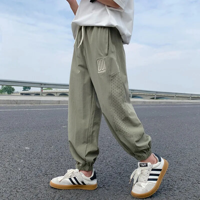 Pantaloni de vară ultra-subțiri din mătase de gheață pentru băieți Pantaloni sport cu uscare rapidă pentru copii mijlocii spre mari, stil nou 2024