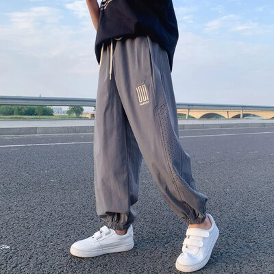 Pantaloni de vară ultra-subțiri din mătase de gheață pentru băieți Pantaloni sport cu uscare rapidă pentru copii mijlocii spre mari, stil nou 2024