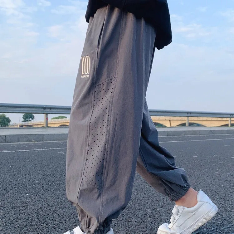 Pantaloni de vară ultra-subțiri din mătase de gheață pentru băieți Pantaloni sport cu uscare rapidă pentru copii mijlocii spre mari, stil nou 2024