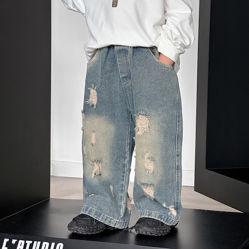 Dječje hlače za dječake jesen 2024. poderane traperice korejska verzija dječjih nošenih hlača cotton shop boy