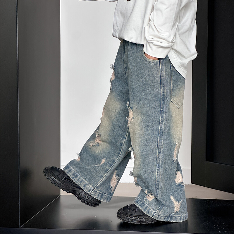 Dječje hlače za dječake jesen 2024. poderane traperice korejska verzija dječjih nošenih hlača cotton shop boy