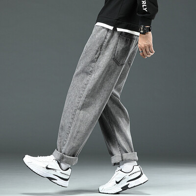 Pavasara liela izmēra džinsi biezas kājas lielas bikšu kājas platas bikses džinsi vīriešu taisnas brīvas bikses platas kājas jaunības plus izmērs 46 44