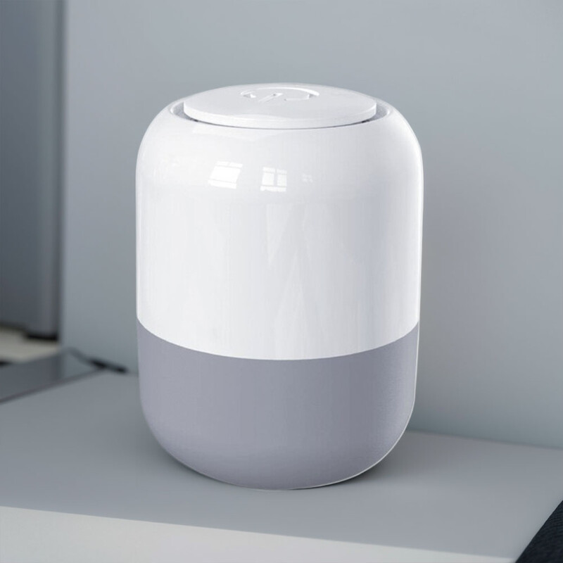 Elektriskais gaisa sūknis vakuuma uzglabāšanas maisiņiem Vietas taupīšanas mini vakuuma blīvēšanas mašīna dažādiem vakuuma blīvēšanas maisiņiem