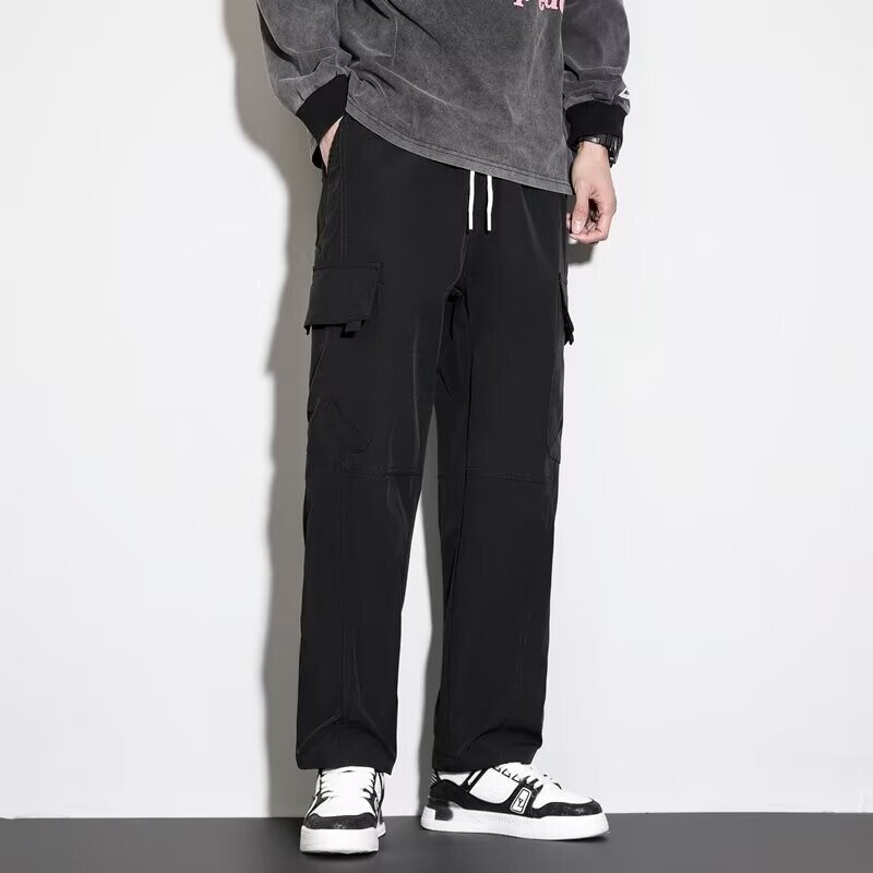 Ljeto 2024. novi stil ledeno svileni kombinezon labavog struka za dječake tanke brzosušeće sportske hlače široke hlače ravnih nogavica muške ležerne