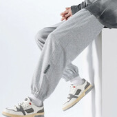 Korejske modne trenirke za trčanje Muške nove jesenske svijetlosive vrećaste hlače širokih nogavica Ulična odjeća Muške ležerne hlače s kravatom Muške