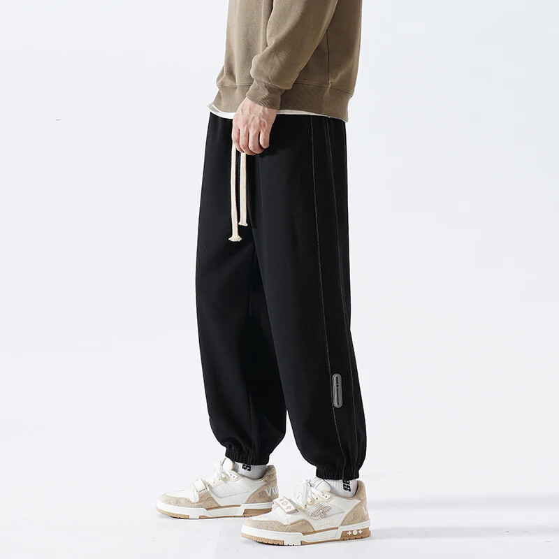 Korejske modne trenirke za trčanje Muške nove jesenske svijetlosive vrećaste hlače širokih nogavica Ulična odjeća Muške ležerne hlače s kravatom Muške