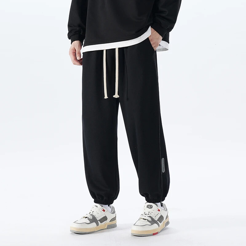 Korejske modne trenirke za trčanje Muške nove jesenske svijetlosive vrećaste hlače širokih nogavica Ulična odjeća Muške ležerne hlače s kravatom Muške