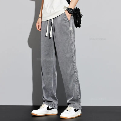 2024. gada jaunas vīriešu mīkstas liocela bikses elastīgas jostasvietas savelkamās bikses platas, taisnas, vīriešu ledus zīda ikdienas bikses, liela izmēra 4XL