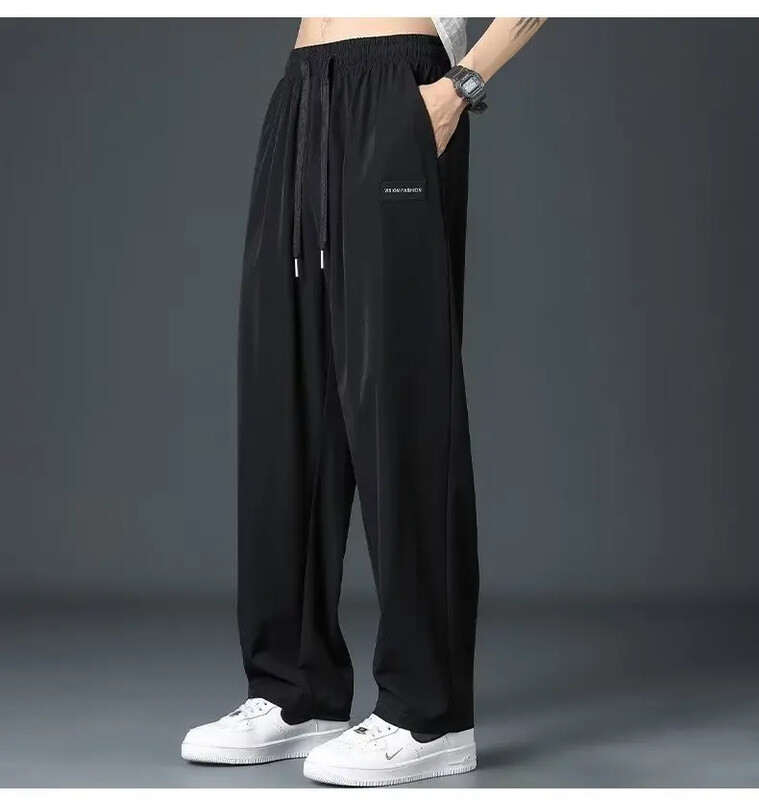 Pantaloni casual pentru bărbați în stil Hong Kong Pantaloni largi, cu picior drept, din mătase de gheață Pantaloni versatili de marcă la modă Scenă casual