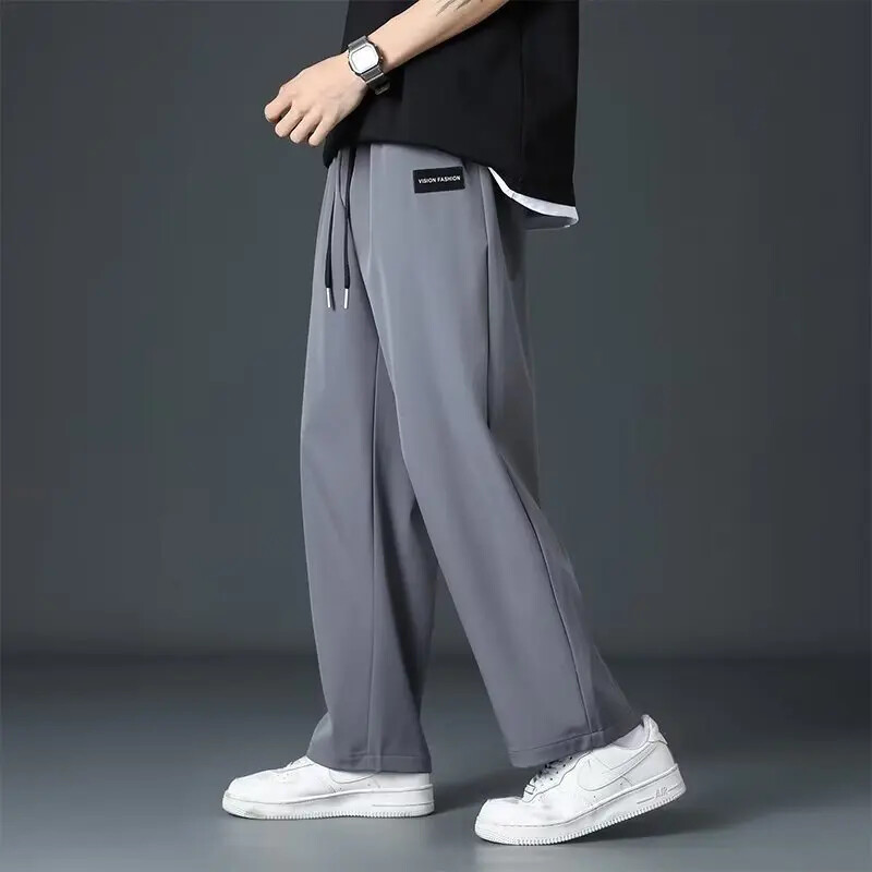 Pantaloni casual pentru bărbați în stil Hong Kong Pantaloni largi, cu picior drept, din mătase de gheață Pantaloni versatili de marcă la modă Scenă casual