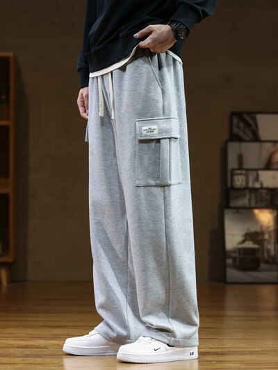 Pantaloni de sport de toamnă Bumbac Bărbați Joggeri largi Pantaloni cargo coreeani neutri Respirabili în aer liber Culoare uni Pantaloni cu picioare largi