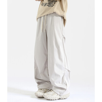 Mauroicardi tavaszi őszi hosszú, laza, alkalmi táskás, folyékony puha fekete széles szárú férfi nadrág húzózsinórral, magas derekú ruházat 2024