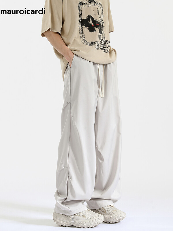 Mauroicardi tavaszi őszi hosszú, laza, alkalmi táskás, folyékony puha fekete széles szárú férfi nadrág húzózsinórral, magas derekú ruházat 2024