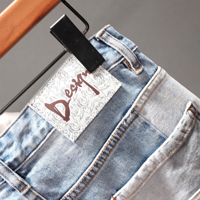 Vīriešu ikdienas džinsa džinsi Pavasara un rudens jaunums, vintage savārstījums Dizaineris kovboju zīmuļu bikses Modes, skaistas bikses