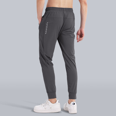 Pantaloni respirabili pentru antrenament de atletism la maraton pentru bărbați Pantaloni subțiri largi pentru bărbați cu buzunare Îmbrăcăminte pentru exerciții de gimnastică Legging elastic