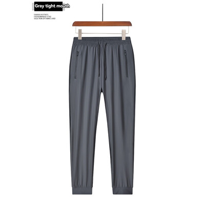 Jaunas ērtas Ice Silk vīriešu sporta bikses Elpojošas, sviedrus absorbējošas Ātri žūstošas āra ērtas skriešanas bikses