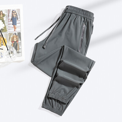 Naujos vasarinės „Ice Silk“ elastinės kelnės vyrams Moterų plonas stilius Madingos laisvos sportinės laisvalaikio poros Patogios tiesios pėdkelnės