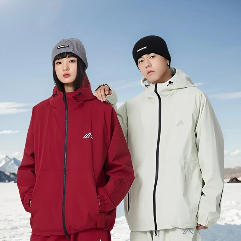 Ziemas sporta brīvas slēpošanas jakas Pārim elpojoši snovborda mēteļi Alpu āra Jauni slēpošanas topi Sieviešu siltas sniega kapuces