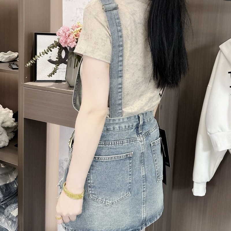 Amerikāņu retro plēstu džinsu svārki ar bikšturi sievietēm, 2024. gada vasara, jauna stila, moderni un novecojoši A līnijas svārki