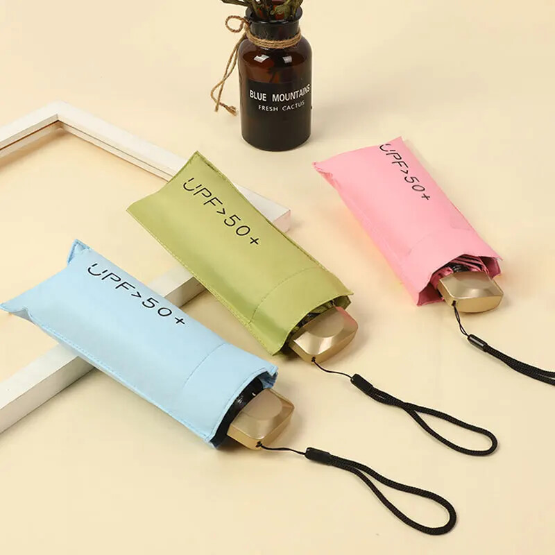 Umbrelă plată de 50 ori Mini umbrelă de soare ultra ușoară Lipici UV pentru femei Umbrelă de protecție solară Strălucire de ploaie Umbrelă de buzunar cu două scopuri